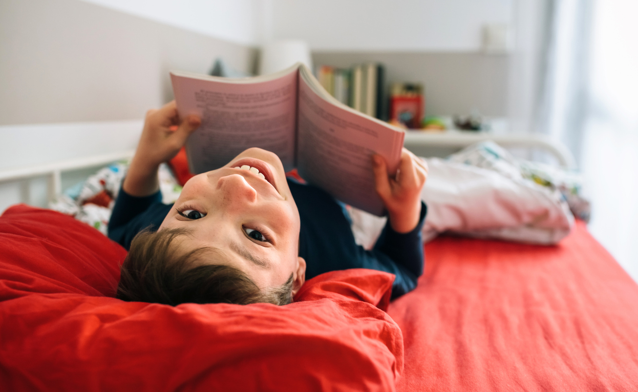 cool kid reading in bed cool kid reading in bed